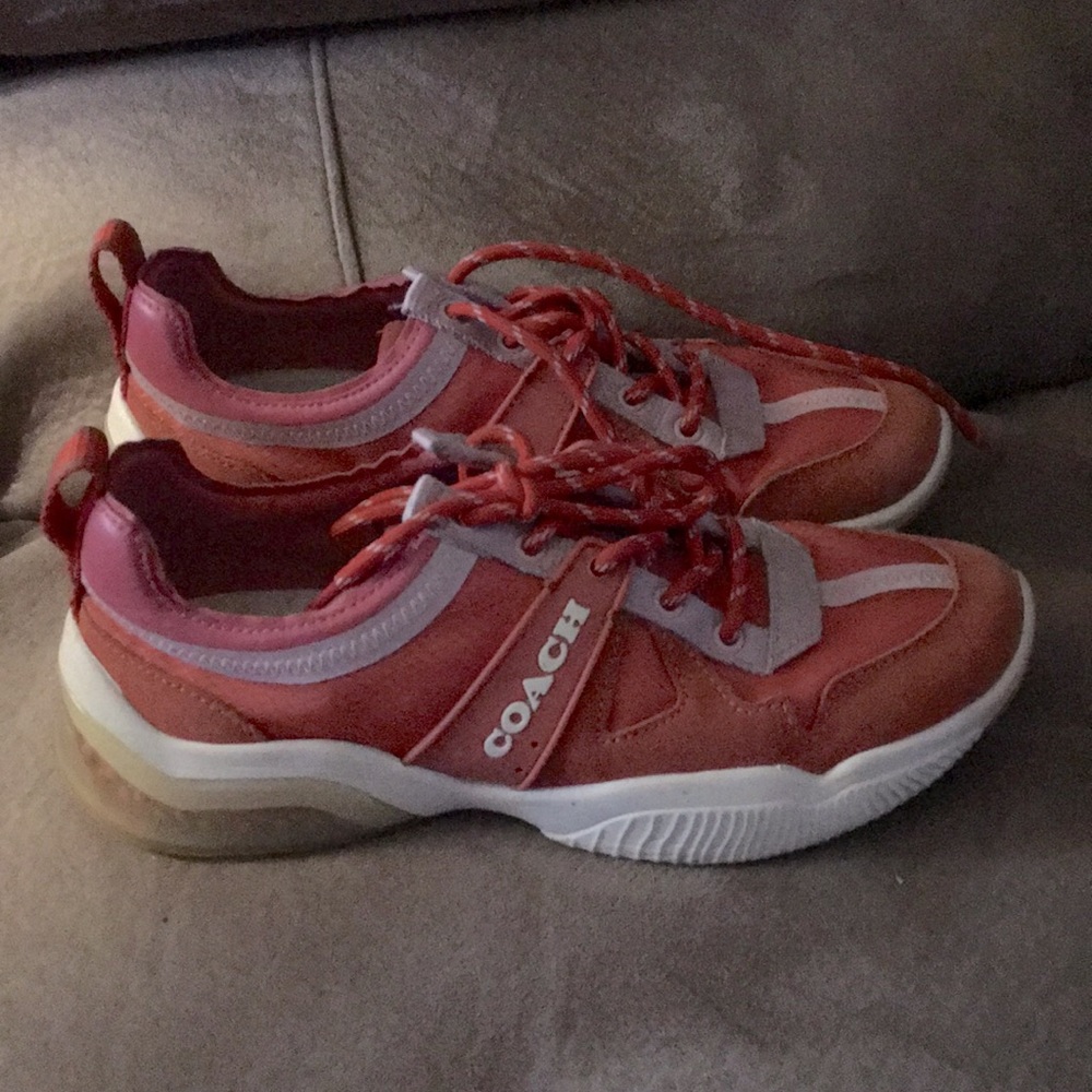 Peachish orangeish color coach shoes